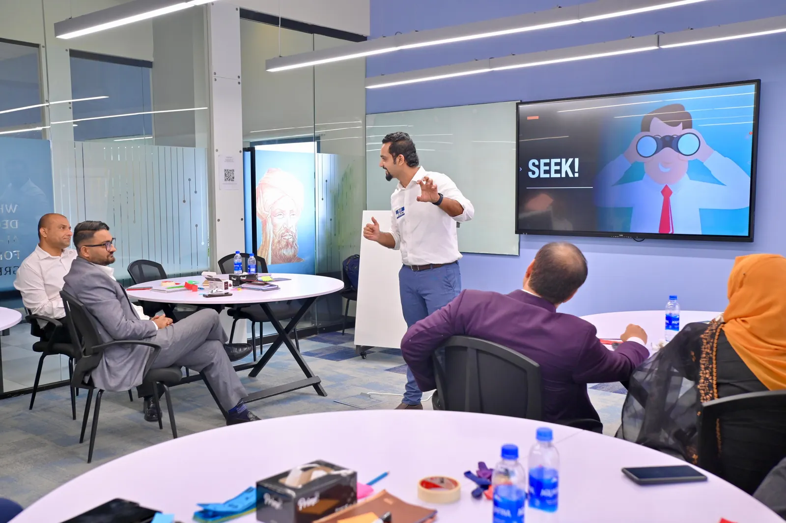 Zain Goplani briefing participants on an interactive sales activity