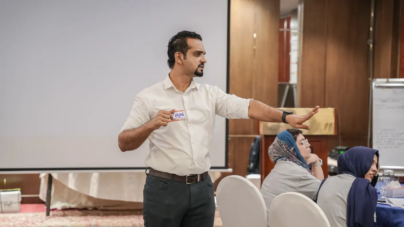 Zain Goplani facilitating an interactive problem-solving session